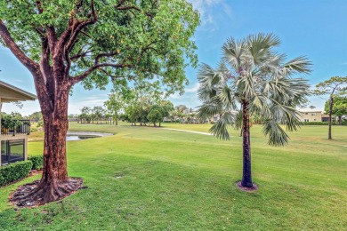 This exceptional corner unit offers a prime location with on Riverbend Golf Club in Florida - for sale on GolfHomes.com, golf home, golf lot