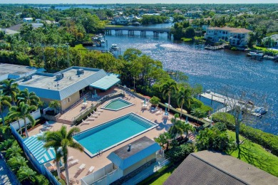 This exceptional corner unit offers a prime location with on Riverbend Golf Club in Florida - for sale on GolfHomes.com, golf home, golf lot