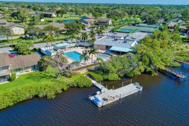 This exceptional corner unit offers a prime location with on Riverbend Golf Club in Florida - for sale on GolfHomes.com, golf home, golf lot