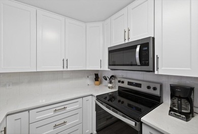 Nestled within Seascape Resort, this 3BR/3BA residence captures on Seascape Golf Course in Florida - for sale on GolfHomes.com, golf home, golf lot