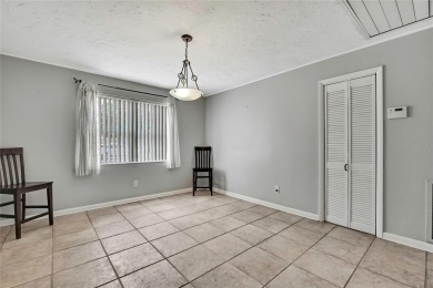 Located in FOREST HILLS, this charming Mid-Century home sits on on Babe Zaharias Golf Course in Florida - for sale on GolfHomes.com, golf home, golf lot