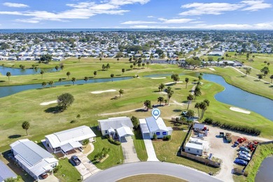 Rarely available directly on Golf Course. Enjoy the ideal on Barefoot Bay Golf Course in Florida - for sale on GolfHomes.com, golf home, golf lot
