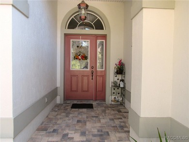 Charming three-bedroom, two-bathroom home featuring a two-car on Pine Ridge Community Golf and Country Club in Florida - for sale on GolfHomes.com, golf home, golf lot