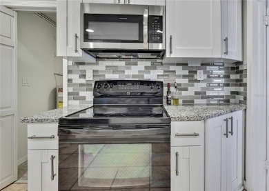 Located in FOREST HILLS, this charming Mid-Century home sits on on Babe Zaharias Golf Course in Florida - for sale on GolfHomes.com, golf home, golf lot