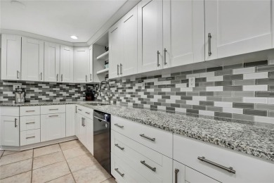 Located in FOREST HILLS, this charming Mid-Century home sits on on Babe Zaharias Golf Course in Florida - for sale on GolfHomes.com, golf home, golf lot