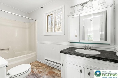 Experience lake living and year around amenities in the heart of on Lake Naomi Timber Trails Golf Club in Pennsylvania - for sale on GolfHomes.com, golf home, golf lot