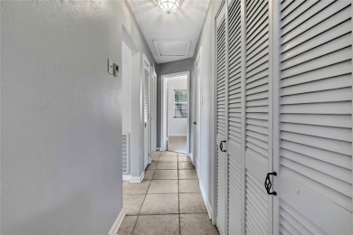 Located in FOREST HILLS, this charming Mid-Century home sits on on Babe Zaharias Golf Course in Florida - for sale on GolfHomes.com, golf home, golf lot