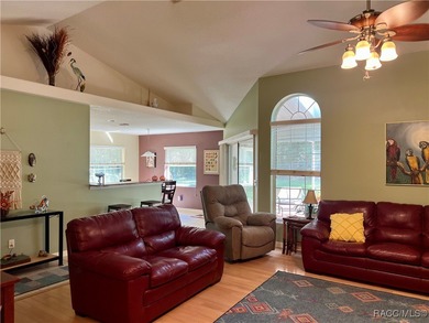 Charming three-bedroom, two-bathroom home featuring a two-car on Pine Ridge Community Golf and Country Club in Florida - for sale on GolfHomes.com, golf home, golf lot