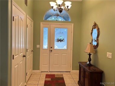 Charming three-bedroom, two-bathroom home featuring a two-car on Pine Ridge Community Golf and Country Club in Florida - for sale on GolfHomes.com, golf home, golf lot