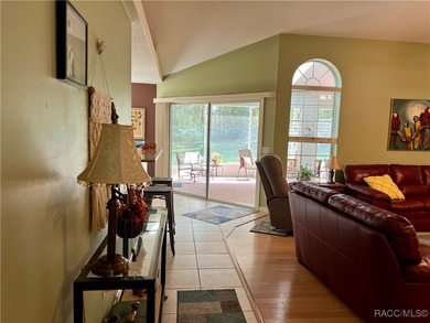 Charming three-bedroom, two-bathroom home featuring a two-car on Pine Ridge Community Golf and Country Club in Florida - for sale on GolfHomes.com, golf home, golf lot