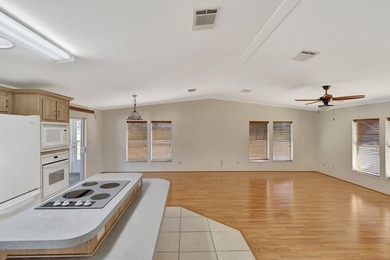 Rarely available directly on Golf Course. Enjoy the ideal on Barefoot Bay Golf Course in Florida - for sale on GolfHomes.com, golf home, golf lot