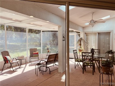 Charming three-bedroom, two-bathroom home featuring a two-car on Pine Ridge Community Golf and Country Club in Florida - for sale on GolfHomes.com, golf home, golf lot