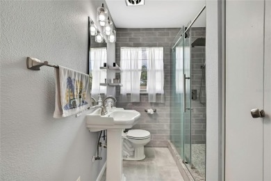 Located in FOREST HILLS, this charming Mid-Century home sits on on Babe Zaharias Golf Course in Florida - for sale on GolfHomes.com, golf home, golf lot
