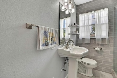 Located in FOREST HILLS, this charming Mid-Century home sits on on Babe Zaharias Golf Course in Florida - for sale on GolfHomes.com, golf home, golf lot