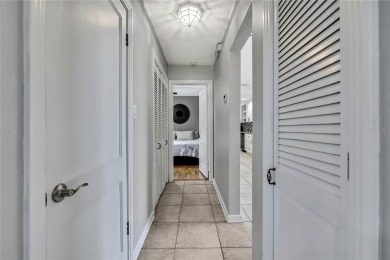 Located in FOREST HILLS, this charming Mid-Century home sits on on Babe Zaharias Golf Course in Florida - for sale on GolfHomes.com, golf home, golf lot