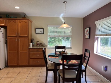 Charming three-bedroom, two-bathroom home featuring a two-car on Pine Ridge Community Golf and Country Club in Florida - for sale on GolfHomes.com, golf home, golf lot