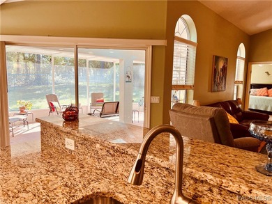 Charming three-bedroom, two-bathroom home featuring a two-car on Pine Ridge Community Golf and Country Club in Florida - for sale on GolfHomes.com, golf home, golf lot