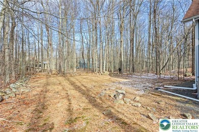 Experience lake living and year around amenities in the heart of on Lake Naomi Timber Trails Golf Club in Pennsylvania - for sale on GolfHomes.com, golf home, golf lot