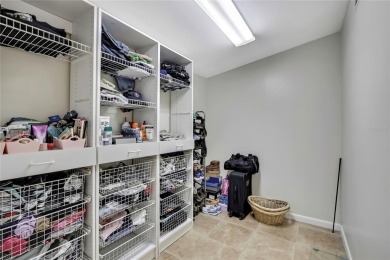 Located in FOREST HILLS, this charming Mid-Century home sits on on Babe Zaharias Golf Course in Florida - for sale on GolfHomes.com, golf home, golf lot