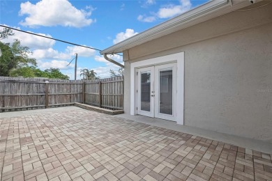 Located in FOREST HILLS, this charming Mid-Century home sits on on Babe Zaharias Golf Course in Florida - for sale on GolfHomes.com, golf home, golf lot