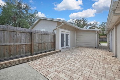 Located in FOREST HILLS, this charming Mid-Century home sits on on Babe Zaharias Golf Course in Florida - for sale on GolfHomes.com, golf home, golf lot