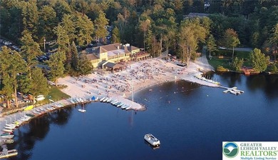 Experience lake living and year around amenities in the heart of on Lake Naomi Timber Trails Golf Club in Pennsylvania - for sale on GolfHomes.com, golf home, golf lot