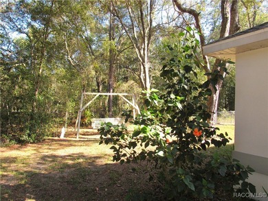 Charming three-bedroom, two-bathroom home featuring a two-car on Pine Ridge Community Golf and Country Club in Florida - for sale on GolfHomes.com, golf home, golf lot