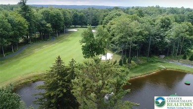 Experience lake living and year around amenities in the heart of on Lake Naomi Timber Trails Golf Club in Pennsylvania - for sale on GolfHomes.com, golf home, golf lot