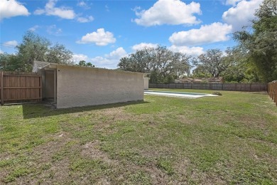 Located in FOREST HILLS, this charming Mid-Century home sits on on Babe Zaharias Golf Course in Florida - for sale on GolfHomes.com, golf home, golf lot