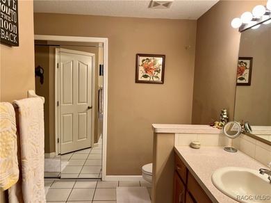 Charming three-bedroom, two-bathroom home featuring a two-car on Pine Ridge Community Golf and Country Club in Florida - for sale on GolfHomes.com, golf home, golf lot