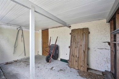 Located in FOREST HILLS, this charming Mid-Century home sits on on Babe Zaharias Golf Course in Florida - for sale on GolfHomes.com, golf home, golf lot
