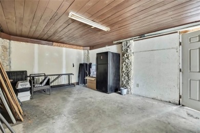 Located in FOREST HILLS, this charming Mid-Century home sits on on Babe Zaharias Golf Course in Florida - for sale on GolfHomes.com, golf home, golf lot