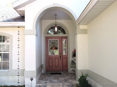 Charming three-bedroom, two-bathroom home featuring a two-car on Pine Ridge Community Golf and Country Club in Florida - for sale on GolfHomes.com, golf home, golf lot