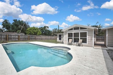 Located in FOREST HILLS, this charming Mid-Century home sits on on Babe Zaharias Golf Course in Florida - for sale on GolfHomes.com, golf home, golf lot