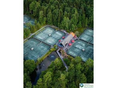 Experience lake living and year around amenities in the heart of on Lake Naomi Timber Trails Golf Club in Pennsylvania - for sale on GolfHomes.com, golf home, golf lot