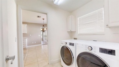 ****BOND PAID!! DESIGNER 0LEANDER MODEL IN THE SOUGHT AFTER on Glenview Championship Golf and Country Club in Florida - for sale on GolfHomes.com, golf home, golf lot
