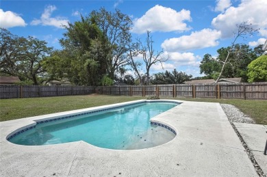 Located in FOREST HILLS, this charming Mid-Century home sits on on Babe Zaharias Golf Course in Florida - for sale on GolfHomes.com, golf home, golf lot