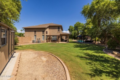 Welcome to this stunning home with a new AC in 2022, paid off on Seville Golf and Country Club in Arizona - for sale on GolfHomes.com, golf home, golf lot