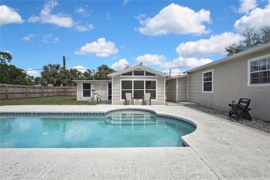 Located in FOREST HILLS, this charming Mid-Century home sits on on Babe Zaharias Golf Course in Florida - for sale on GolfHomes.com, golf home, golf lot