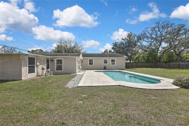 Located in FOREST HILLS, this charming Mid-Century home sits on on Babe Zaharias Golf Course in Florida - for sale on GolfHomes.com, golf home, golf lot