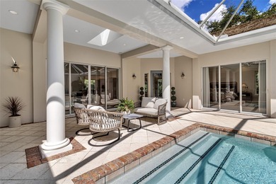 Although built in the 20th century, this home looks as authentic on The Oaks Club in Florida - for sale on GolfHomes.com, golf home, golf lot