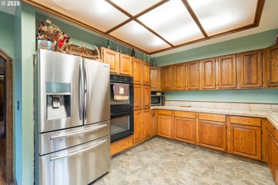 Custom built 4BD, 2BA Home nestled on 1 acre with Golf Course on Alderbrook Golf Course in Oregon - for sale on GolfHomes.com, golf home, golf lot