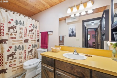 Custom built 4BD, 2BA Home nestled on 1 acre with Golf Course on Alderbrook Golf Course in Oregon - for sale on GolfHomes.com, golf home, golf lot