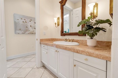 Although built in the 20th century, this home looks as authentic on The Oaks Club in Florida - for sale on GolfHomes.com, golf home, golf lot