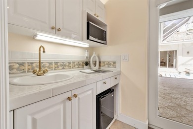 Although built in the 20th century, this home looks as authentic on The Oaks Club in Florida - for sale on GolfHomes.com, golf home, golf lot