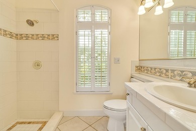 Although built in the 20th century, this home looks as authentic on The Oaks Club in Florida - for sale on GolfHomes.com, golf home, golf lot