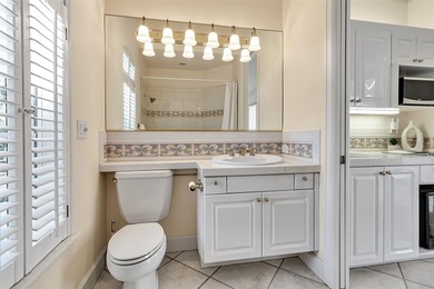 Although built in the 20th century, this home looks as authentic on The Oaks Club in Florida - for sale on GolfHomes.com, golf home, golf lot