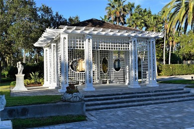Although built in the 20th century, this home looks as authentic on The Oaks Club in Florida - for sale on GolfHomes.com, golf home, golf lot