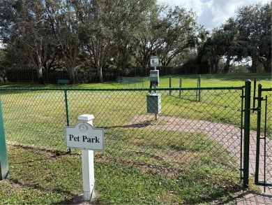 This spacious condo has updraded travertine tile throughout on Gateway Golf and Country Club in Florida - for sale on GolfHomes.com, golf home, golf lot
