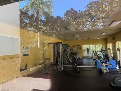This spacious condo has updraded travertine tile throughout on Gateway Golf and Country Club in Florida - for sale on GolfHomes.com, golf home, golf lot